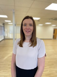 Photo of Fiona Brailsford wearing a white short sleeved top and black skirt