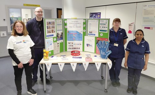 Clinical trials day research nurses at stall in Arrowe Park Hospital